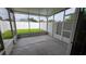 View of the screened patio with a fenced backyard at 6415 Torrington Cir, Lakeland, FL 33811