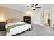 Bedroom featuring a ceiling fan, closet, and neutral decor at 6819 Broken Arrow S Trl, Lakeland, FL 33813
