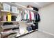 Organized closet with shelving, hanging rods, and storage baskets at 6819 Broken Arrow S Trl, Lakeland, FL 33813
