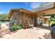 Exterior view featuring a pool and a covered patio area for outdoor relaxation and entertainment at 6819 Broken Arrow S Trl, Lakeland, FL 33813