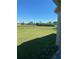 A spacious backyard featuring a green lawn, ideal for outdoor activities at 8159 Woodvine Cir, Lakeland, FL 33810
