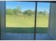 Green backyard with views of greenery at 8159 Woodvine Cir, Lakeland, FL 33810