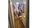 View of bathroom with a vanity with granite countertop and tiled floors at 8159 Woodvine Cir, Lakeland, FL 33810