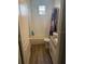 Bright bathroom featuring a tub, shower, toilet, and granite countertop at 8159 Woodvine Cir, Lakeland, FL 33810
