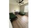 This is a simple bedroom with two beds and a dresser for storage at 8159 Woodvine Cir, Lakeland, FL 33810
