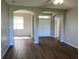 Open-concept living space with arched doorways and abundant natural light at 8159 Woodvine Cir, Lakeland, FL 33810