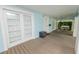 Spacious front porch with double doors and swing at 817 College Ave, Lakeland, FL 33801