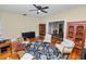 Spacious living room with hardwood floors and ample seating at 817 College Ave, Lakeland, FL 33801