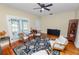 Cozy living room with hardwood floors and natural light at 817 College Ave, Lakeland, FL 33801