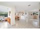 Bright dining area with a stylish table and chairs, connected to a area, offering a casual atmosphere at 818 Woodward St, Lakeland, FL 33803