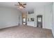 Inviting living room with neutral tones and open layout, offering seamless flow throughout the home at 8323 Greystone Dr, Lakeland, FL 33810