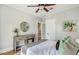 Well-lit bedroom with a ceiling fan and styled decor at 838 S Tennessee Ave, Lakeland, FL 33801