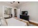 Serene bedroom featuring a large mirror closet, providing a spacious feel at 838 S Tennessee Ave, Lakeland, FL 33801