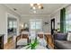 Inviting living room with hardwood floors, neutral tones, and natural light at 838 S Tennessee Ave, Lakeland, FL 33801