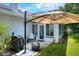 Covered patio with outdoor seating and BBQ, perfect for entertaining or relaxing at 1145 Denton St, Lakeland, FL 33803