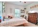 Bright bedroom with large window, desk, shelving, and wardrobe at 1145 Denton St, Lakeland, FL 33803