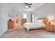 Spacious bedroom with carpet flooring, ceiling fan, and natural light at 1145 Denton St, Lakeland, FL 33803