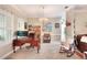 Bright office space with a classic desk and chair, illuminated by a chandelier at 1145 Denton St, Lakeland, FL 33803