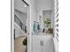 Hall bathroom featuring modern finishes including marble countertop, dark fixture and an artistic mirror at 1170 Windjammer Dr, Lakeland, FL 33803