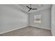 Bedroom with hardwood floors, bright light and ceiling fan at 1170 Windjammer Dr, Lakeland, FL 33803