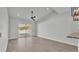Bright living room with sliding glass doors leading to an outdoor patio at 1170 Windjammer Dr, Lakeland, FL 33803
