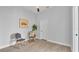 Brightly lit room with a decorative pillow, furniture and artwork at 1172 Windjammer Dr, Lakeland, FL 33803
