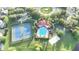 Community amenities including a pool, tennis courts, basketball court, playground, and lush landscaping at 11761 Bella Milano Ct, Windermere, FL 34786