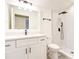 Modern bathroom featuring white vanity with quartz countertop and a large walk-in shower at 11761 Bella Milano Ct, Windermere, FL 34786