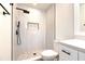 Sleek bathroom with a frameless glass shower, black fixtures, and marbled accent tiles at 11761 Bella Milano Ct, Windermere, FL 34786