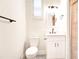 This is a well-lit bathroom with modern fixtures, vanity, and a stylish mirror at 11761 Bella Milano Ct, Windermere, FL 34786