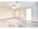 Spacious bedroom featuring new floors and multiple doorways for easy access at 11761 Bella Milano Ct, Windermere, FL 34786