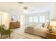 Inviting bedroom with neutral tones, ample natural light, and stylish furnishings at 11761 Bella Milano Ct, Windermere, FL 34786