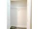 This is an empty walk-in closet with white walls, white doors, and a wire shelf at 11761 Bella Milano Ct, Windermere, FL 34786