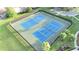 Aerial view of two well-maintained tennis courts, perfect for recreational play at 11761 Bella Milano Ct, Windermere, FL 34786
