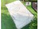 Aerial view of a community volleyball court surrounded by well-maintained green grass at 11761 Bella Milano Ct, Windermere, FL 34786