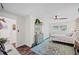 Bright bedroom with an accent wall, ceiling fan, and closet space at 1307 Fairlee St, Lakeland, FL 33813