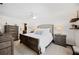 Well-lit bedroom with neutral tones, a ceiling fan, and stylish furniture at 1307 Fairlee St, Lakeland, FL 33813