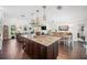 Open floor plan kitchen with a view to the living room and dining area at 1307 Fairlee St, Lakeland, FL 33813