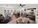 Living space with a large island, stainless steel appliances, and dining area at 1307 Fairlee St, Lakeland, FL 33813