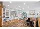 Bright office space with built-in shelving, a wooden work table, and stylish decor at 1307 Fairlee St, Lakeland, FL 33813