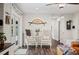 Cozy sitting area featuring white brick wall, decorative chairs and view of the pool at 1307 Fairlee St, Lakeland, FL 33813