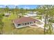 Aerial view of the property highlighting the spacious backyard and detached garage at 13522 Rockridge Rd, Lakeland, FL 33809