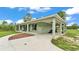 Single-story home with covered parking and beautifully landscaped surroundings at 13522 Rockridge Rd, Lakeland, FL 33809