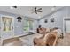 Comfortable living room with natural light, hardwood floors, and a cozy seating area at 13522 Rockridge Rd, Lakeland, FL 33809