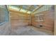 Interior of the barn, showing the construction of a horse stall with secure, boarded-up windows at 1385 Ewell Rd, Lakeland, FL 33811