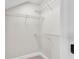 Organized walk-in closet with multiple wire shelves for ample storage at 1385 Ewell Rd, Lakeland, FL 33811