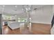 An open-concept living room with hardwood floors and a high ceiling at 1385 Ewell Rd, Lakeland, FL 33811