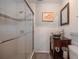 Modern bathroom with glass enclosed shower, designer sink and custom cabinet at 1425 Hallam Dr, Lakeland, FL 33813