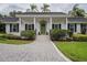 Inviting front entrance with a well-manicured lawn and attractive landscaping at 1425 Hallam Dr, Lakeland, FL 33813