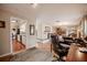 Bright room featuring hardwood floors, a desk, and a view into other rooms at 1425 Hallam Dr, Lakeland, FL 33813